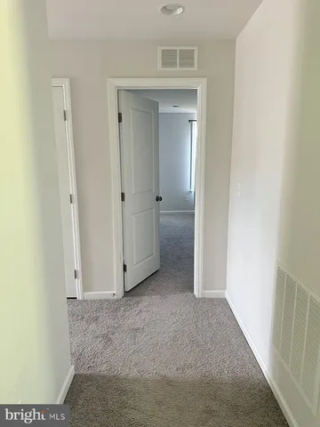 a view of a room with a window