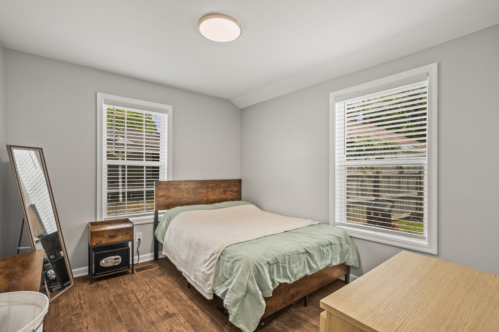 3240 Academy Road Portland, TN 37148 - Photo 21 of 39 a bedroom with a bed next to a window