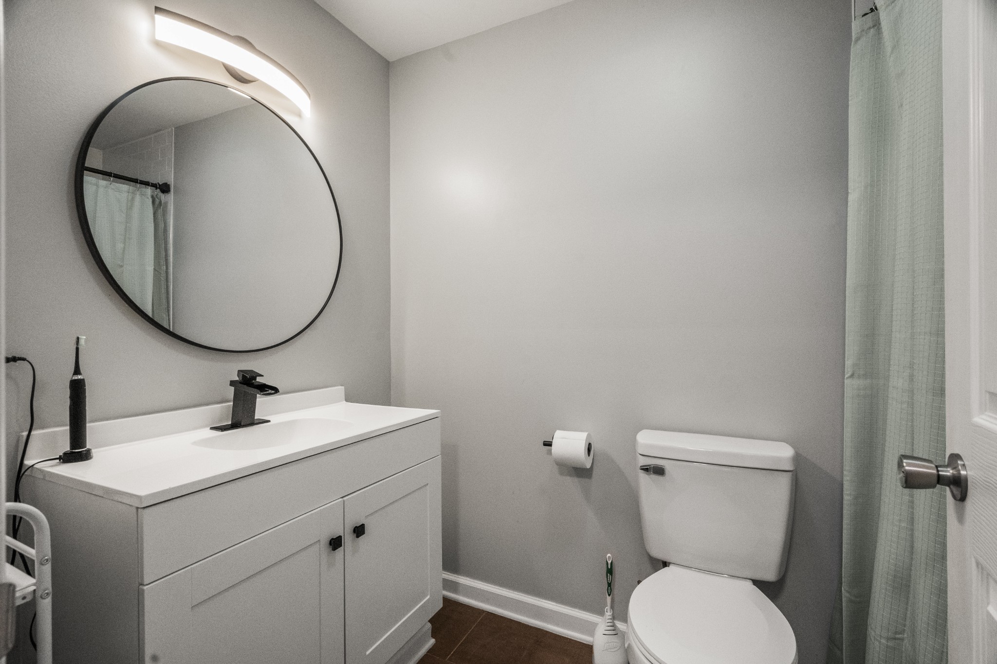 3240 Academy Road Portland, TN 37148 - Photo 24 of 39 a bathroom with a toilet sink and mirror