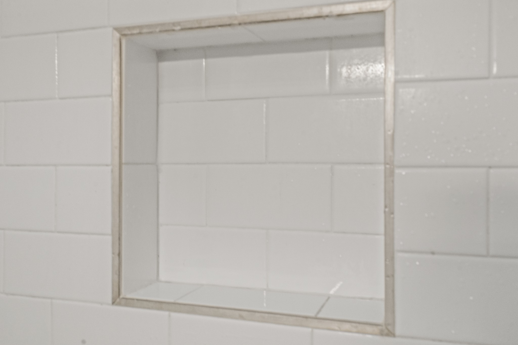 3240 Academy Road Portland, TN 37148 - Photo 27 of 39 a bathroom with a glass shower door