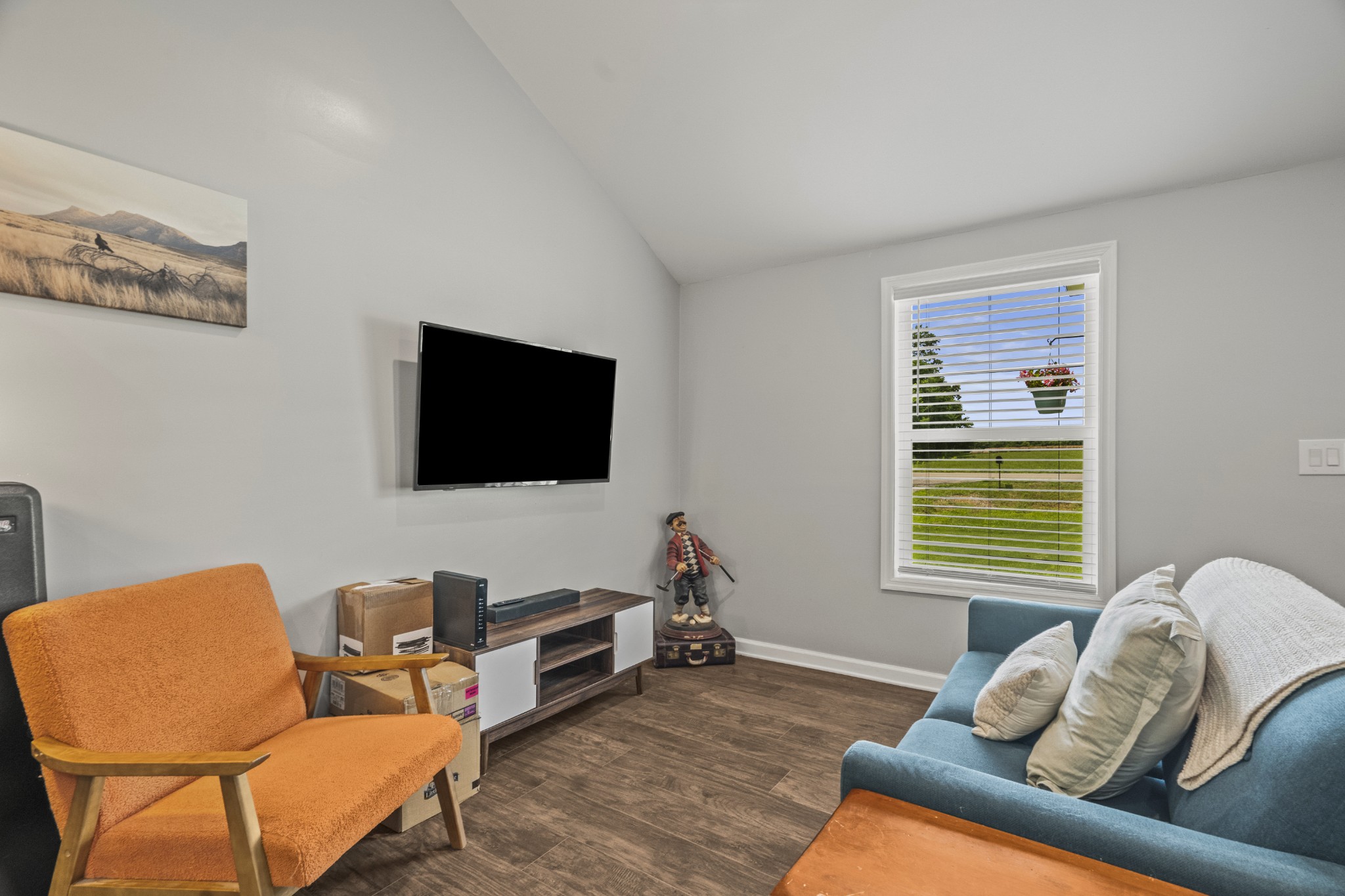 3240 Academy Road Portland, TN 37148 - Photo 9 of 39 a living room with furniture and a flat screen tv
