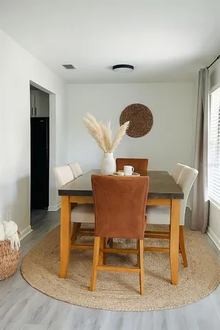 a workspace with furniture and a window