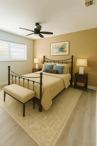 a bedroom with a bed and window