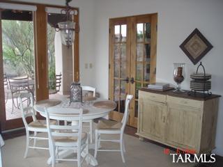 12222 Cloud Ridge Drive Tucson, AZ 85755 - Photo 6 of 10 a dining room with furniture and wooden floor