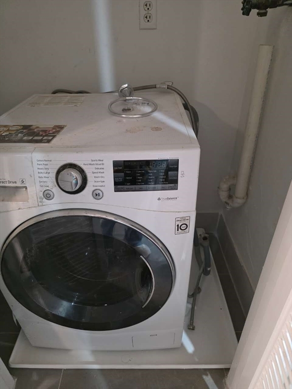 574 Washington Street, Unit 2 Boston, MA 02135 - Photo 11 of 11 a utility room with dryer and washer