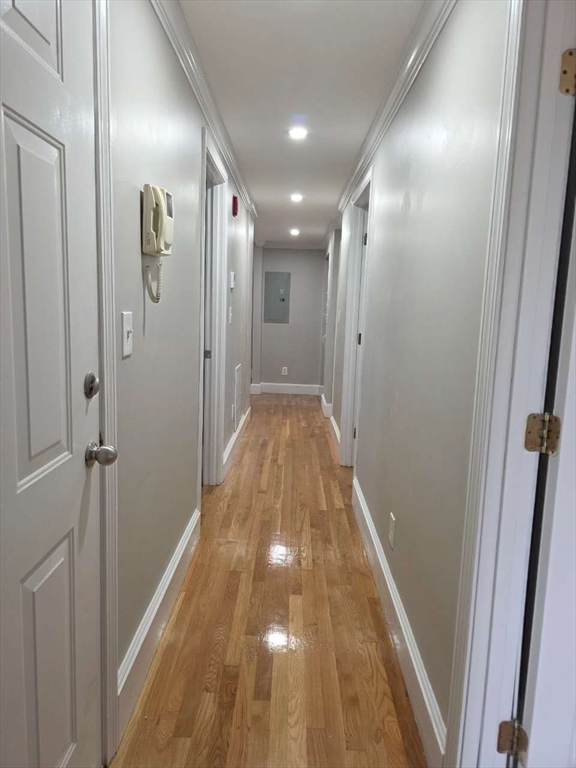 574 Washington Street, Unit 2 Boston, MA 02135 - Photo 5 of 11 a view of a hallway