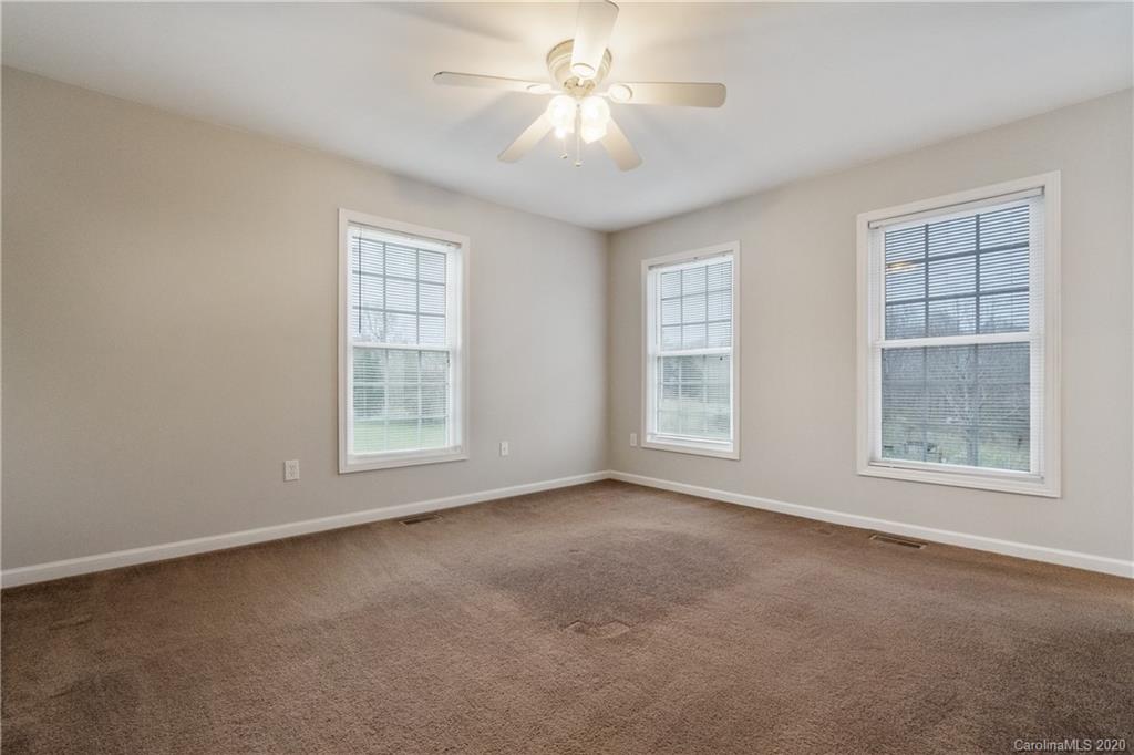 2879 Ranger Road Clover, SC 29710 - Photo 15 of 30 an empty room with windows and fan