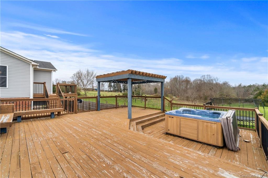 2879 Ranger Road Clover, SC 29710 - Photo 18 of 30 a view of a swimming pool with a lounge chair