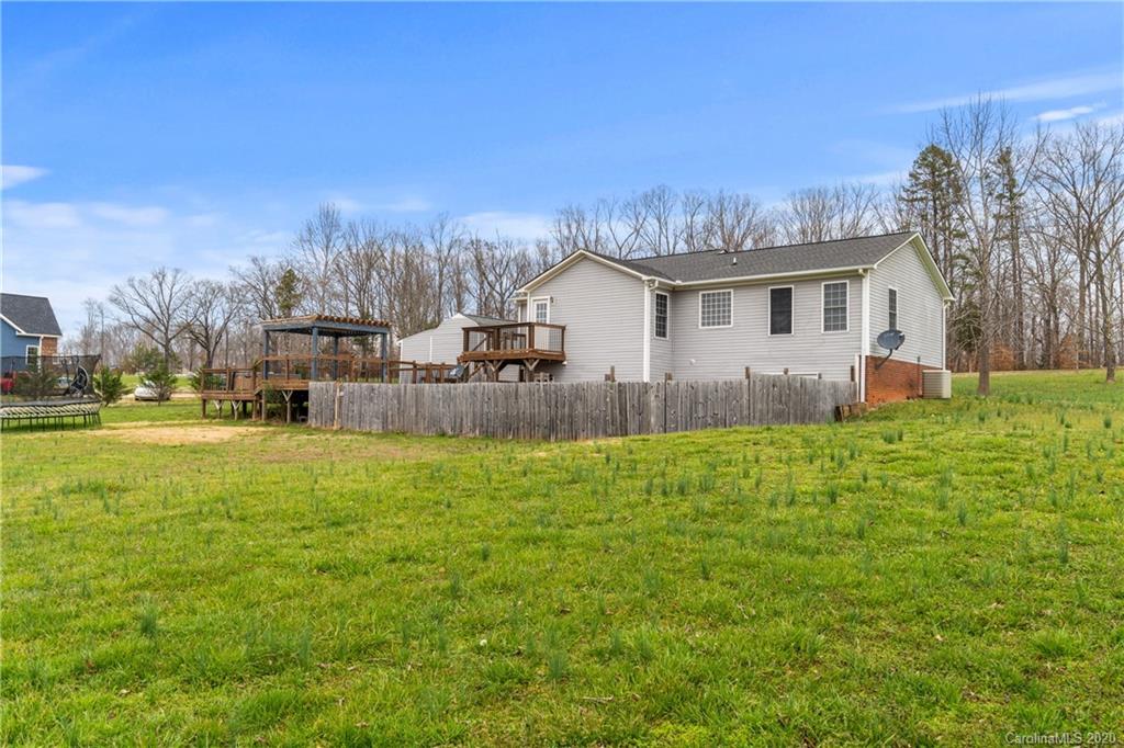2879 Ranger Road Clover, SC 29710 - Photo 21 of 30 a view of a house with a big yard and large trees