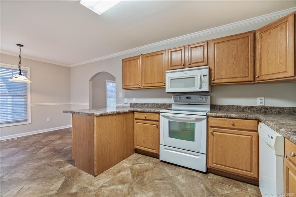 2879 Ranger Road Clover, SC 29710 - Photo 10 of 30 a kitchen with granite countertop cabinets stainless steel appliances and a sink