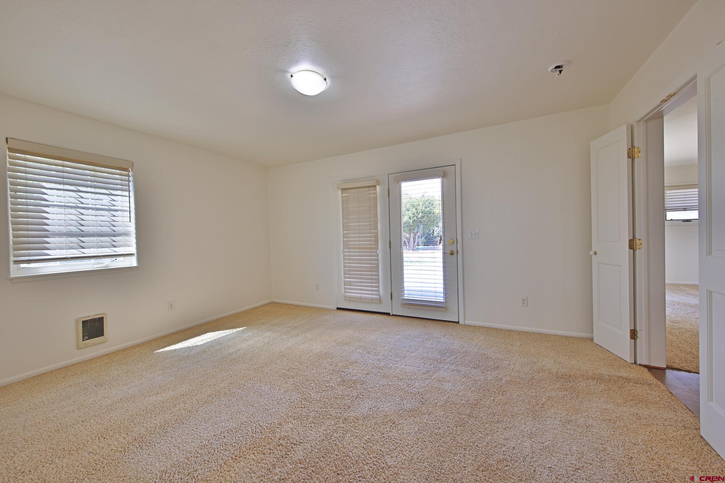 13637 Happy Hollow Road Eckert, CO 81418 - Photo 10 of 38 a view of an empty room with a window