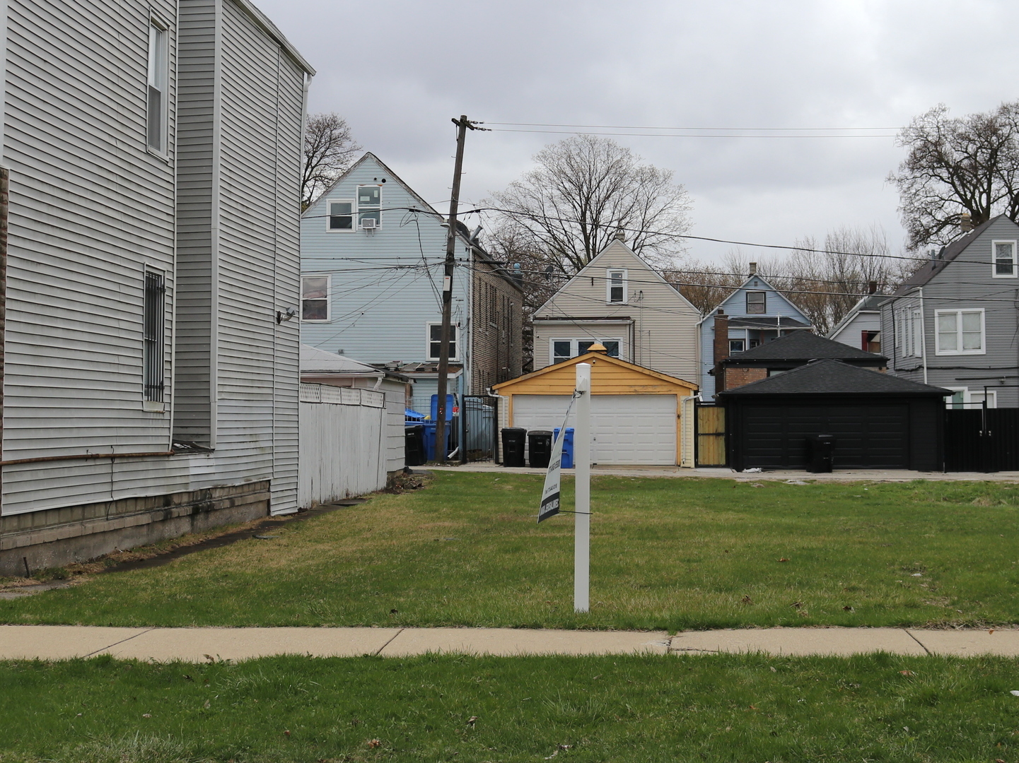 5244 South Honore Street Chicago, IL 60609 - Photo 1 of 1 a front view of a house with a yard