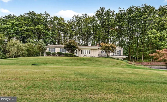 a view of a golf course with a lake