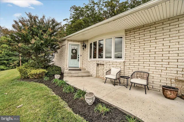 a view of swimming pool with a patio