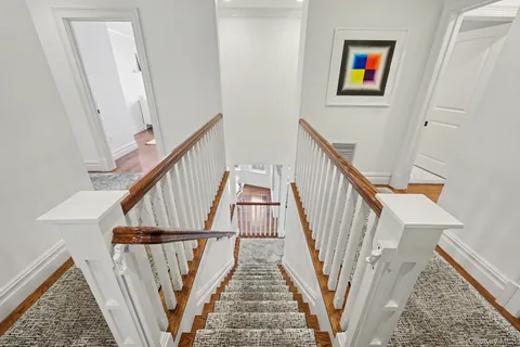 a view of entryway with wooden floor