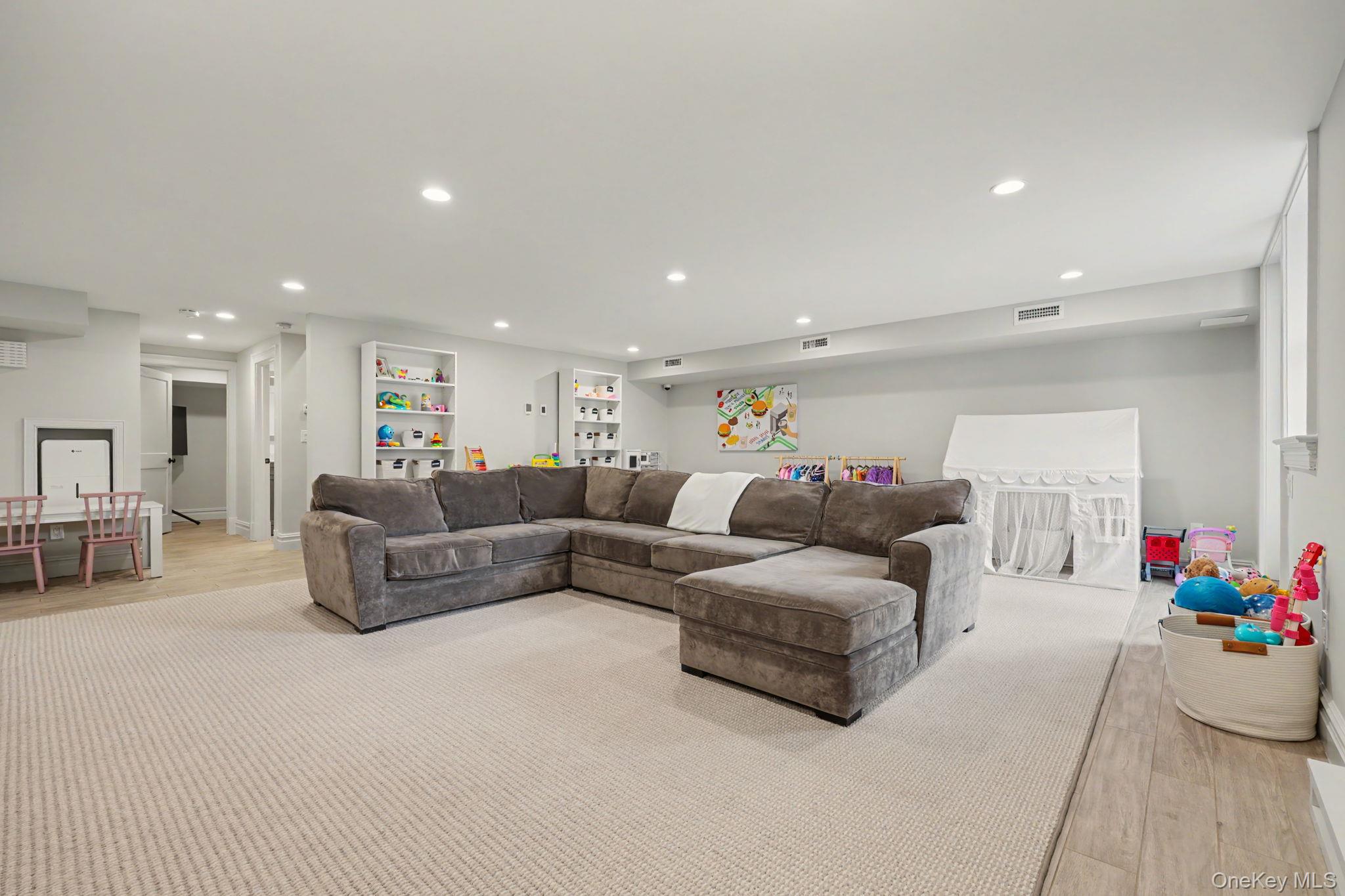 30 Wainwright Street Rye, NY 10580 - Photo 27 of 37 a living room with furniture and flowers