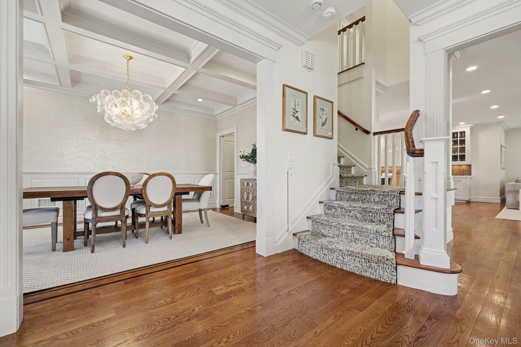 30 Wainwright Street Rye, NY 10580 - Photo 5 of 37 a view of a livingroom kitchen and dinning room with wooden floor