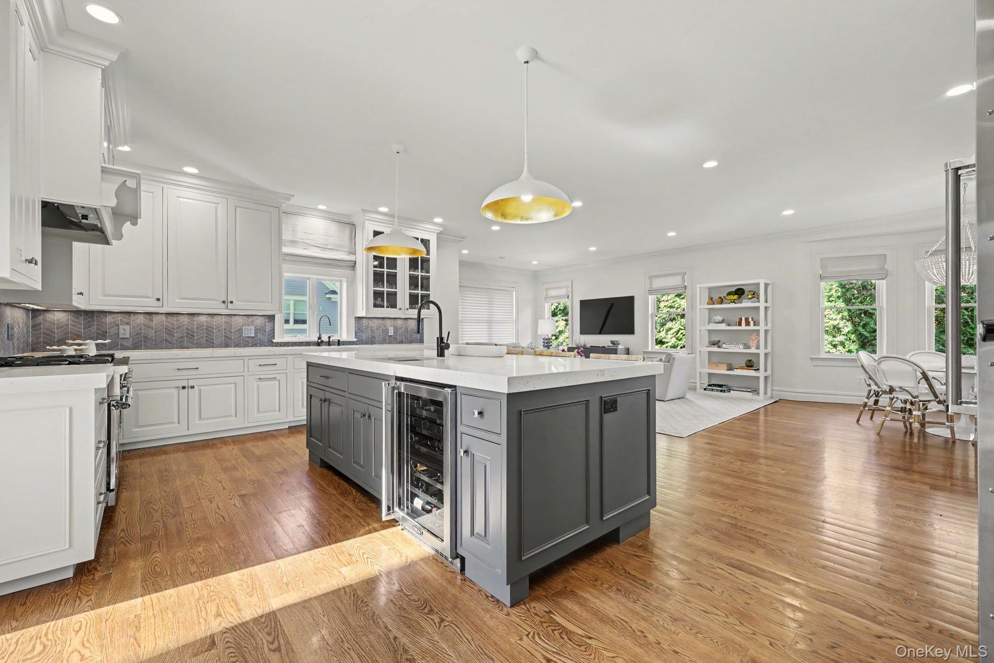 30 Wainwright Street Rye, NY 10580 - Photo 9 of 37 a kitchen with a sink cabinets and wooden floor