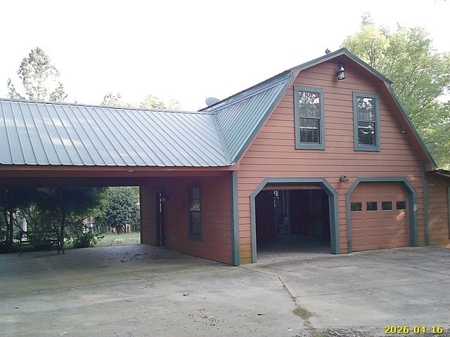81 Brady Road Buena Vista, GA 31803 - Photo 15 of 26 a front view of a house with a garage