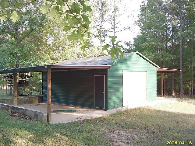 81 Brady Road Buena Vista, GA 31803 - Photo 19 of 26 a house with trees in front of it