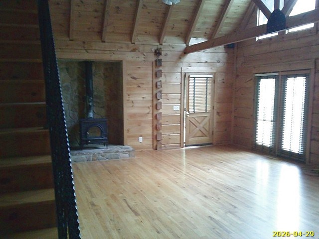 81 Brady Road Buena Vista, GA 31803 - Photo 7 of 26 an empty room with wooden floor and windows
