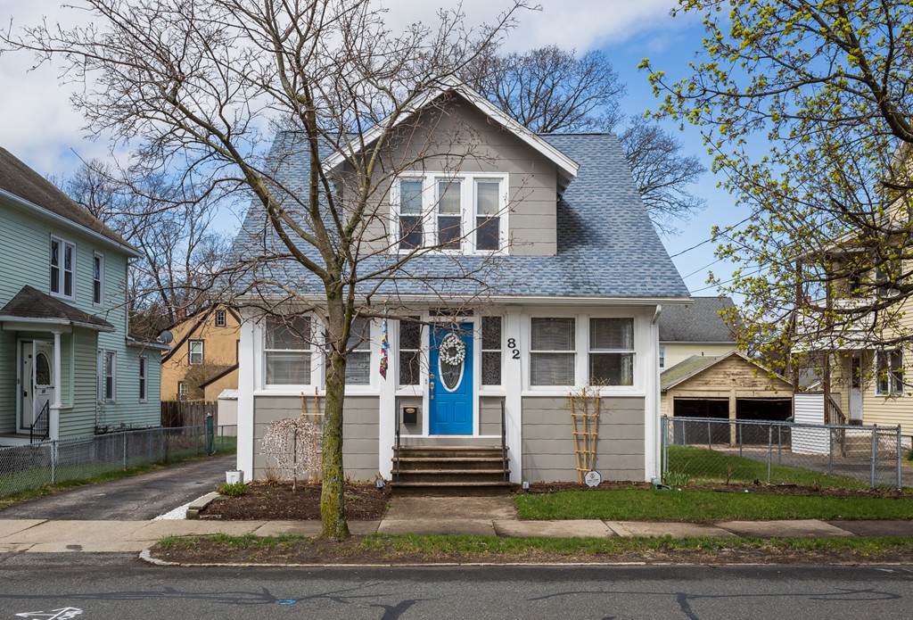 82 Dwight Road Springfield, MA 01108 - Photo 1 of 28 a front view of a house with a yard