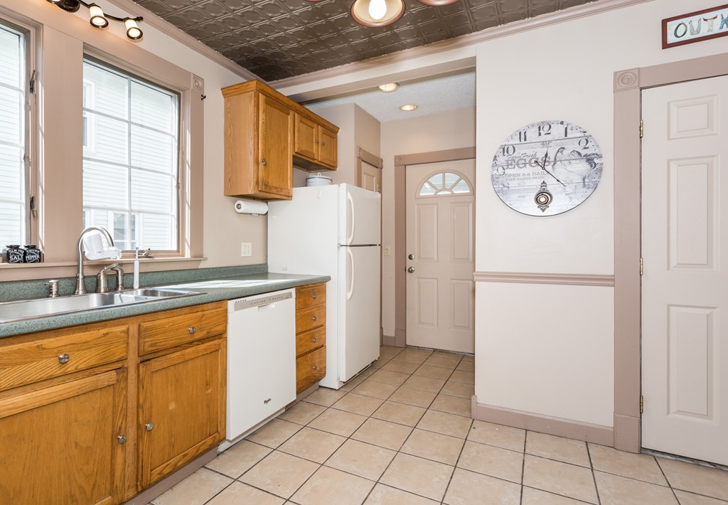 82 Dwight Road Springfield, MA 01108 - Photo 15 of 28 a kitchen with stainless steel appliances granite countertop a refrigerator and a sink