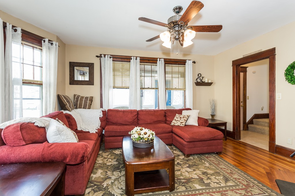 82 Dwight Road Springfield, MA 01108 - Photo 6 of 28 a living room with furniture and a large window