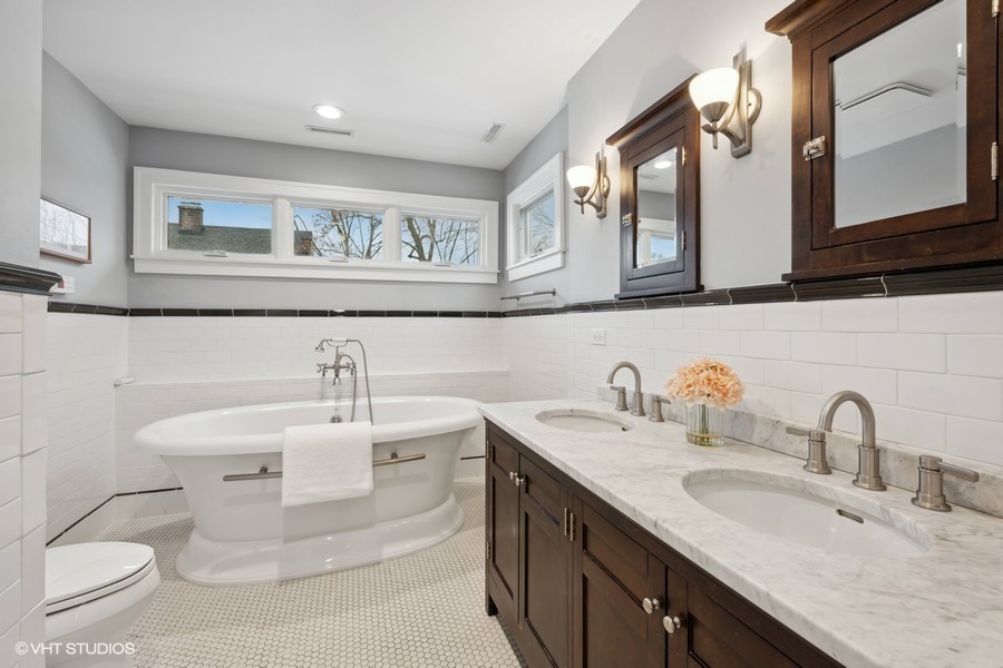 807 Cherry Street Winnetka, IL 60093 - Photo 17 of 37 a bathroom with a sink and a mirror