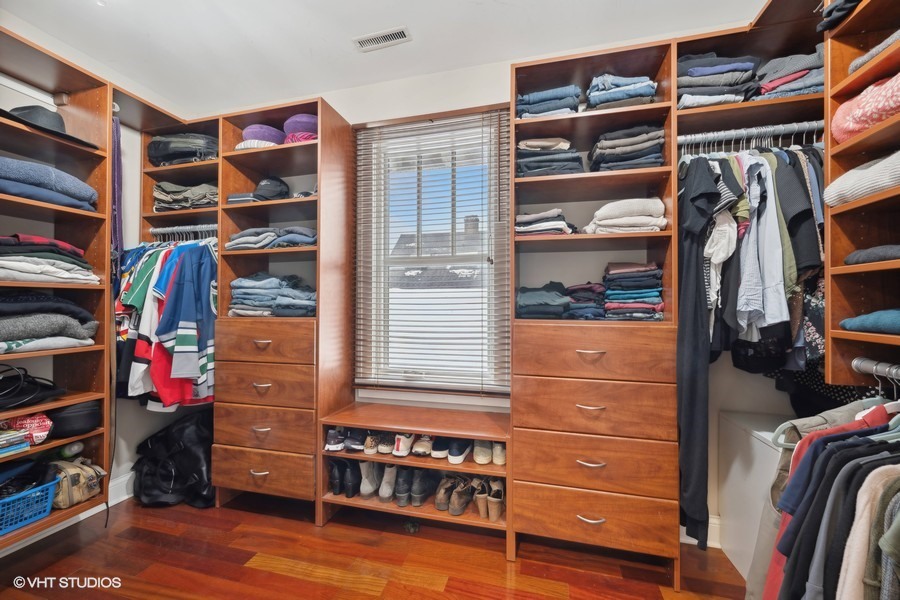 807 Cherry Street Winnetka, IL 60093 - Photo 18 of 37 a view of walk in closet with clothes and shoes