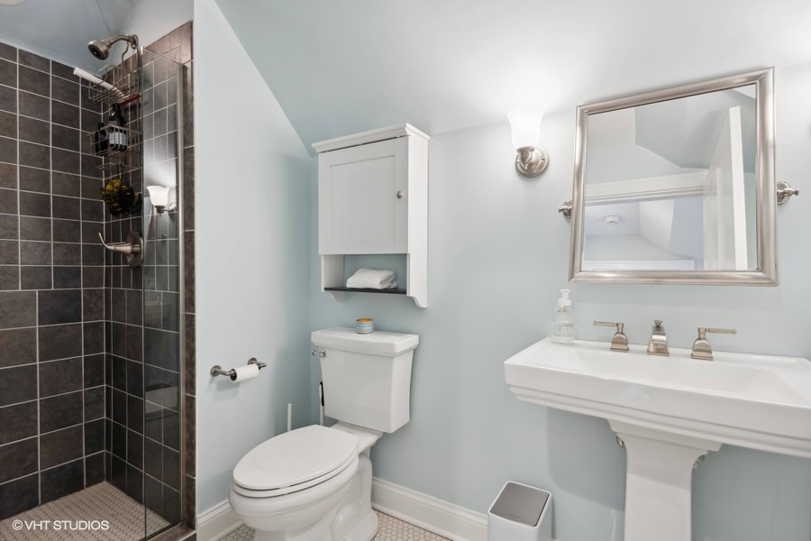 807 Cherry Street Winnetka, IL 60093 - Photo 24 of 37 a bathroom with a toilet sink and mirror