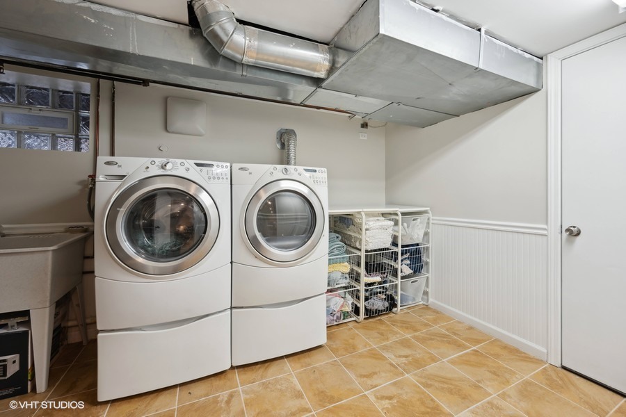 807 Cherry Street Winnetka, IL 60093 - Photo 29 of 37 a utility room with dryer and washer