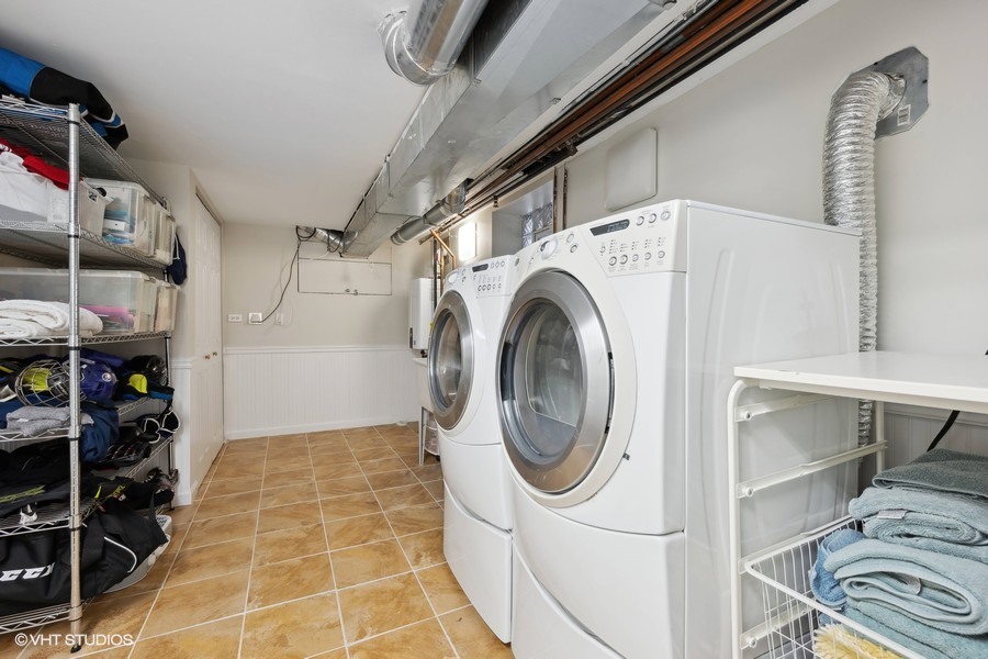 807 Cherry Street Winnetka, IL 60093 - Photo 30 of 37 a utility room with dryer and washer