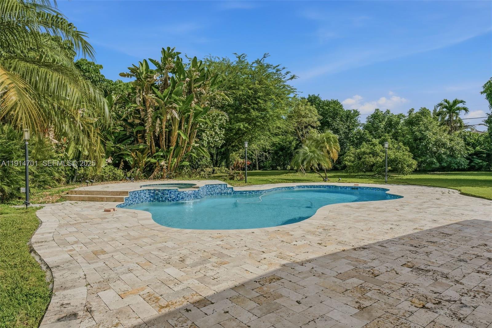 8001 Southwest 66th Terrace Miami, FL 33143 - Photo 31 of 35 a view of a yard