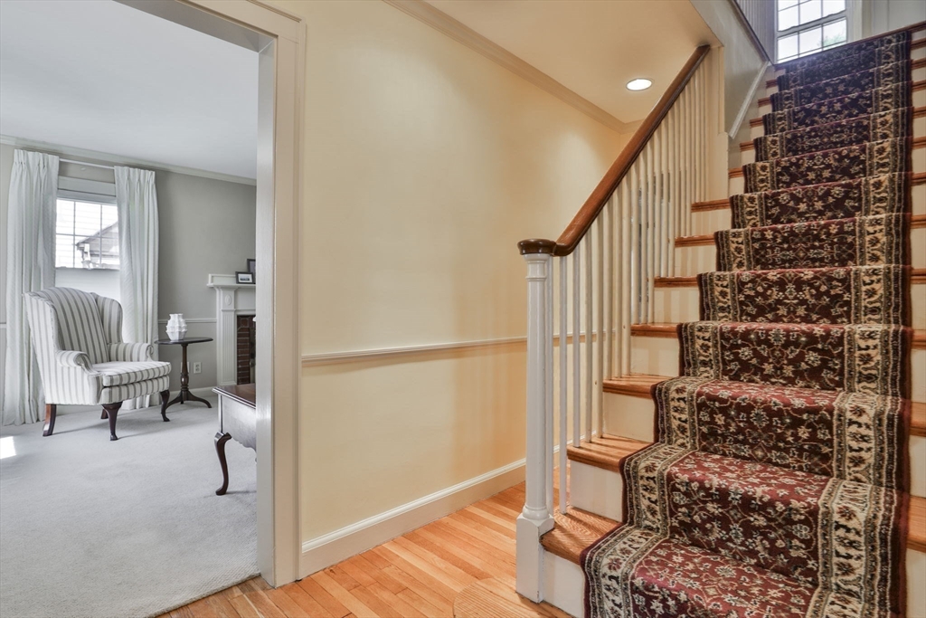1106 Brook Road Milton, MA 02186 - Photo 13 of 25 a view of entryway and hall with wooden floor