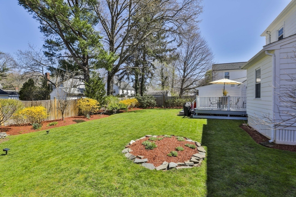 1106 Brook Road Milton, MA 02186 - Photo 23 of 25 a front view of a house with garden