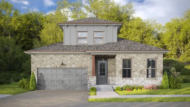a front view of house with yard outdoor seating and green space