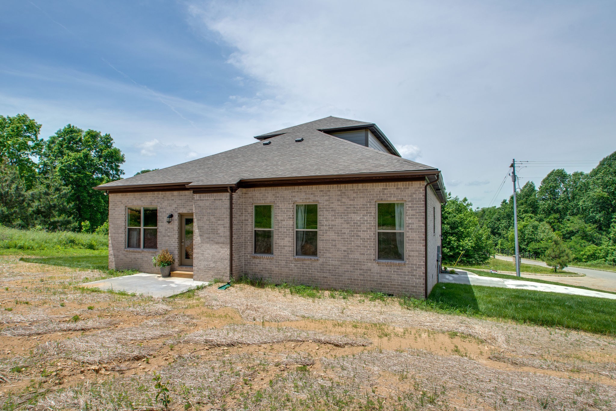 966 Hunters Lane Springfield, TN 37172 - Photo 24 of 27 a front view of a house with a yard and garage