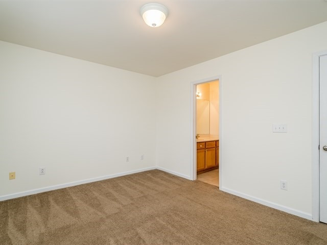 8506 Micollet Court Raleigh, NC 27613 - Photo 19 of 22 Bedroom