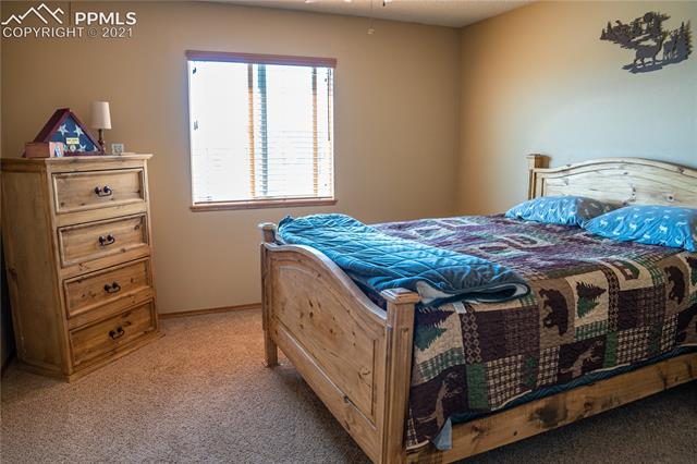8298 Bohleen Road Peyton, CO 80831 - Photo 18 of 28 Mater Bedroom