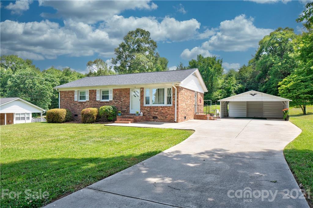 118 Eller Road Gastonia, NC 28056 - Photo 1 of 21 a front view of a house with a yard