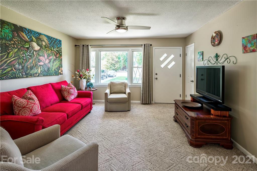 118 Eller Road Gastonia, NC 28056 - Photo 7 of 21 a living room with furniture and a flat screen tv