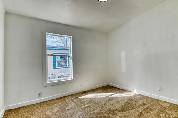 an empty room with a window