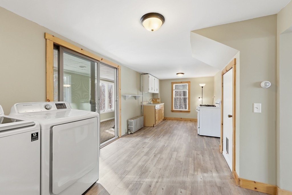 36 Sullivan Avenue Hardwick, MA 01031 - Photo 12 of 42 a view of a kitchen with refrigerator and windows