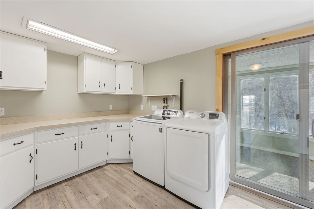 36 Sullivan Avenue Hardwick, MA 01031 - Photo 14 of 42 a kitchen with cabinets appliances a sink and a window