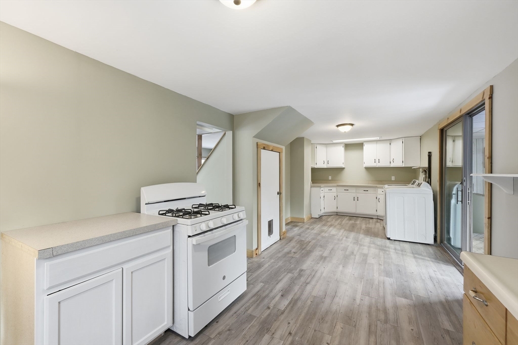 36 Sullivan Avenue Hardwick, MA 01031 - Photo 19 of 42 a kitchen with a stove a sink and a refrigerator