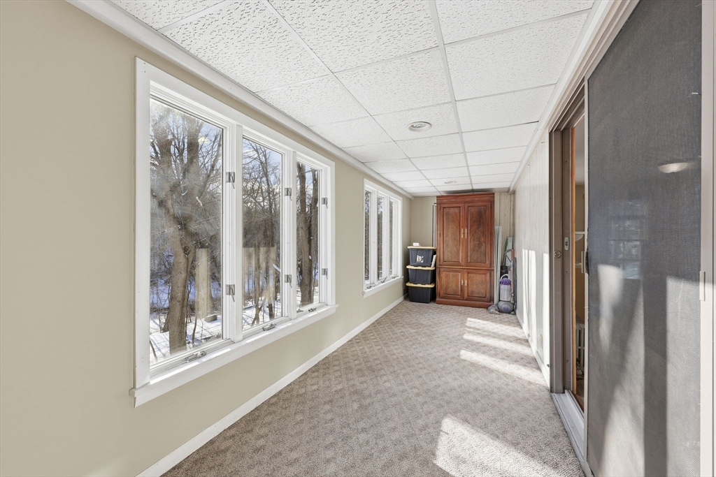36 Sullivan Avenue Hardwick, MA 01031 - Photo 22 of 42 a big room with wooden floor chandelier and windows