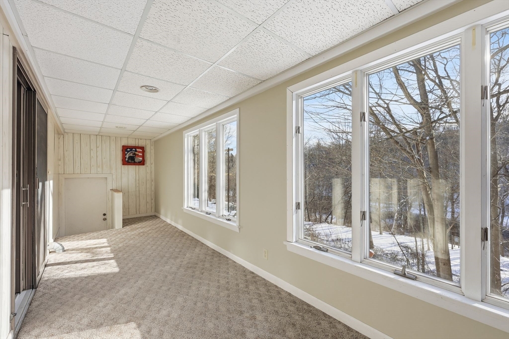 36 Sullivan Avenue Hardwick, MA 01031 - Photo 24 of 42 a view of an empty room with a balcony