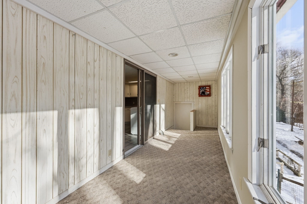 36 Sullivan Avenue Hardwick, MA 01031 - Photo 25 of 42 a view of a hallway with wooden shelves