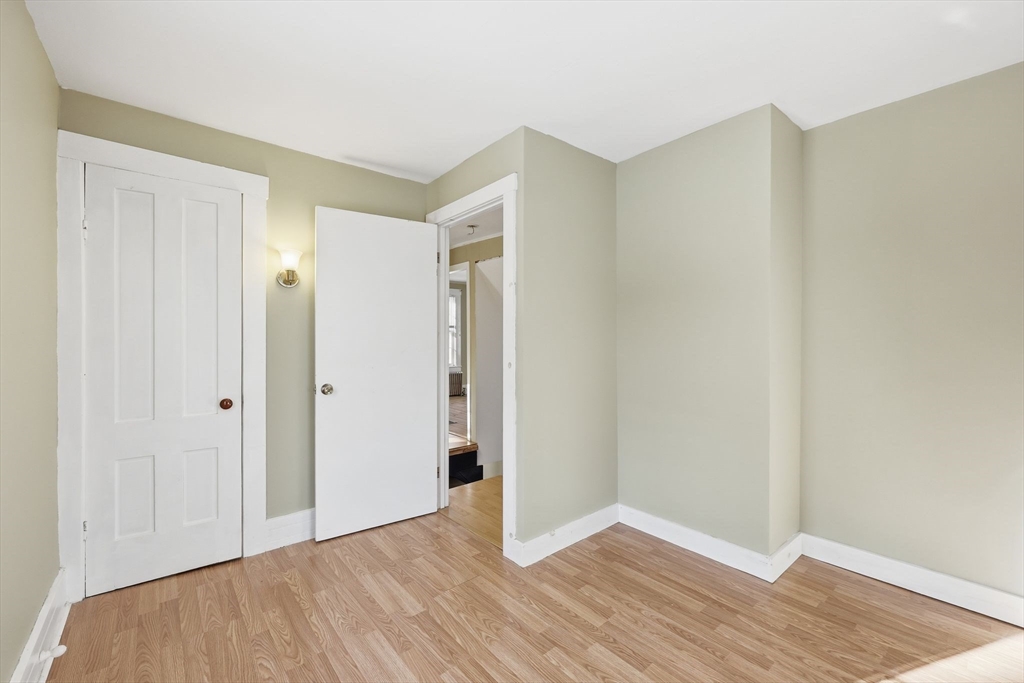36 Sullivan Avenue Hardwick, MA 01031 - Photo 28 of 42 a view of an empty room with wooden floor